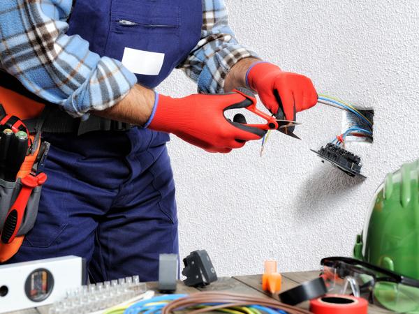 Electrician working safely