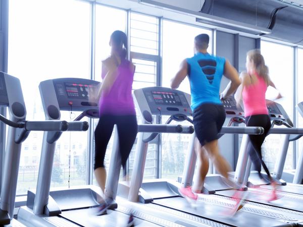 People exercising on treadmills