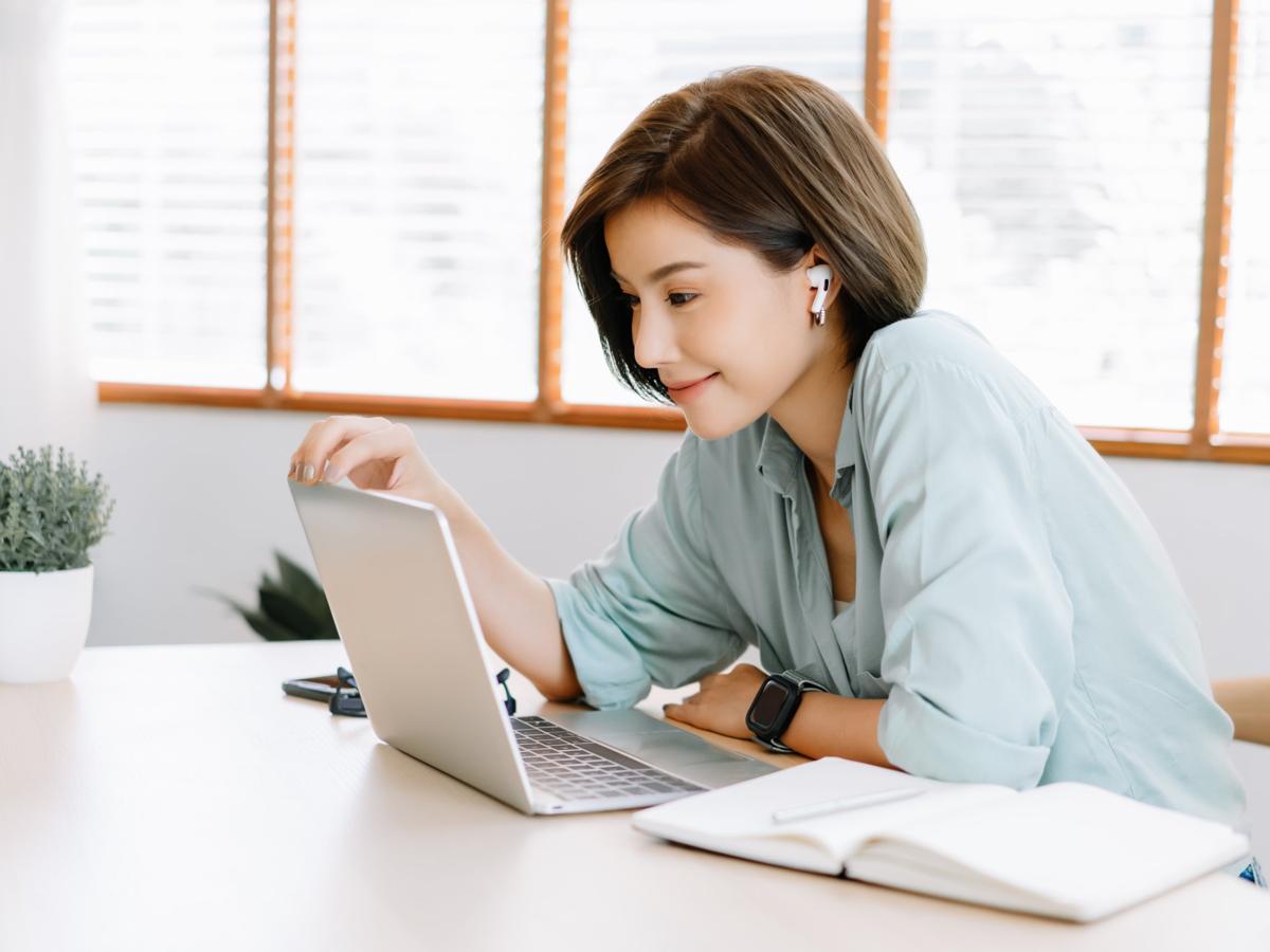 Asian woman working from home