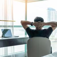 Businessman relaxing in office